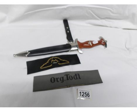 3 items of Nazi memorabilia being dagger with scabbard, 'ORGTODT' armband and Railway cap badge