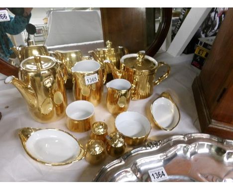 A Royal Worcester gilded teapot, coffee pot, tea ware etc