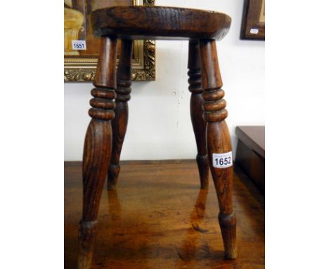 A 19th century oak stool