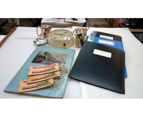 A quantity of railwayana including LNER wall clock, white metal Pullman tableware, South African railways bon bon dish, origi