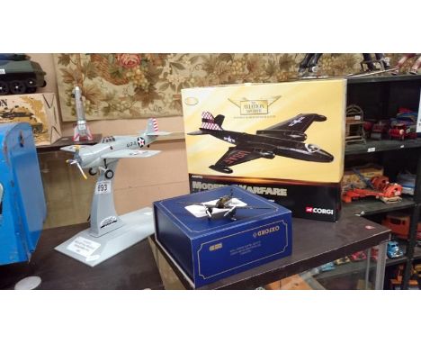 A U.S. navy F4F Wildcat model, a USAF Canberra and a D H 88 Comet