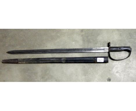 A Victorian sword/ long bayonet with war department arrow on blade also vr 12/82. Blade is toothed for half of it's length