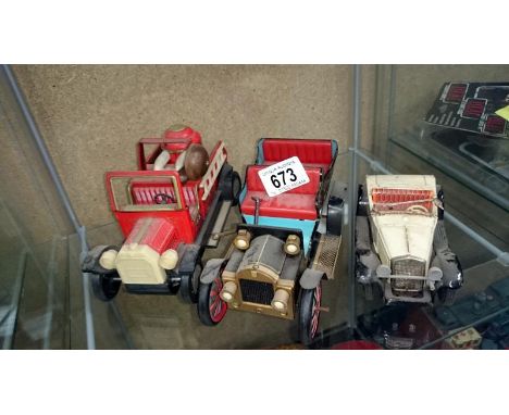 A tinplate modern toys veteran car and 2 Bandai cars, Ford model A and a fire engine