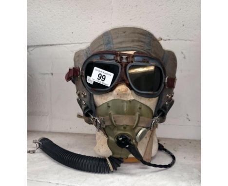 RAF pilots cloth helmet, oxygen mask and goggles mounted on a dummy head