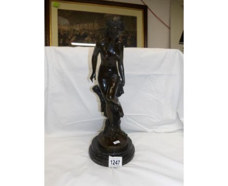 A bronze nude figure