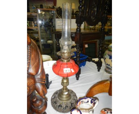 Oil lamp with red glass vessel
