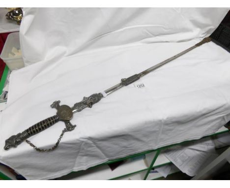 A highly decorated sword with scabbard, marked on blade 'Geo. Lauterer, Chicago, ILL.