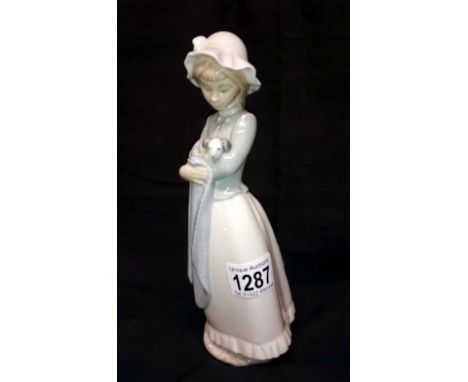 Nao figure of girl with puppy