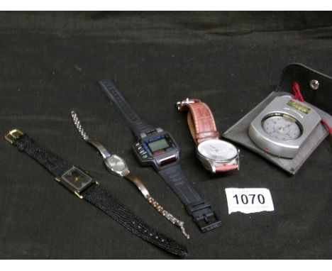 A Suunto compass, a Calvin Klien watch and 3 other watches