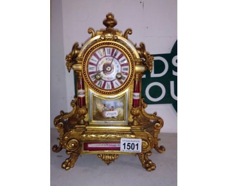 An ornate ormalu clock face a/f