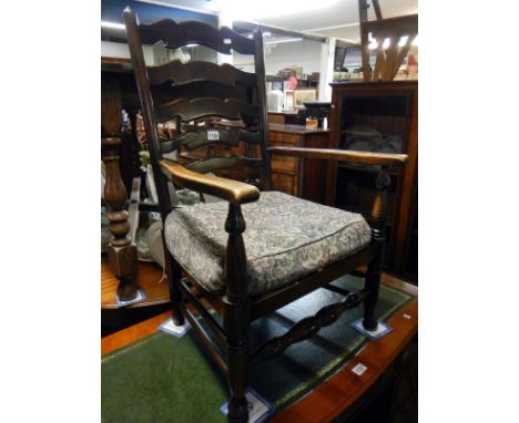 An oak carver ladder back chair