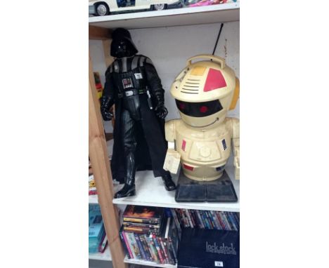 A tall figure of Darth Vader & a robot
