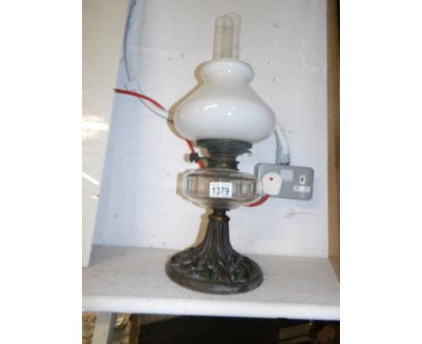 An art nouveau oil lamp with Hinks double burner