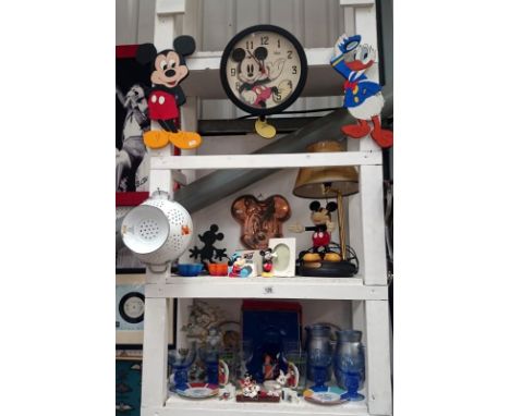 A Mickey mouse lamp etc and other assorted memorabila inc. Disney - 3 shelves