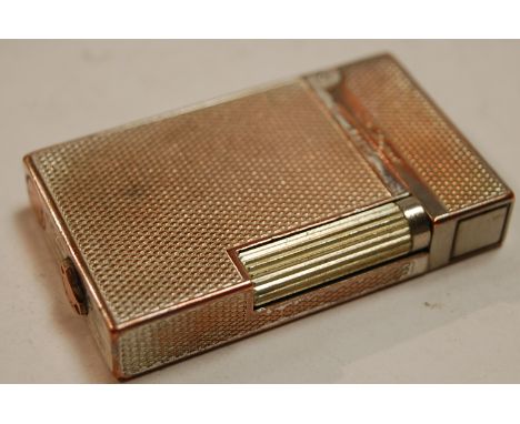An S T Dupont of Paris pocket cigarette lighter 