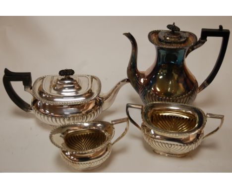 An early 20th century silver plated four piece tea and coffee service in the 18th century style