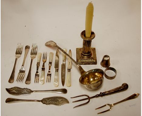 A collection of miscellaneous silver plated wares to include WMF ladle, dwarf column candlestick, loose flatwares etc