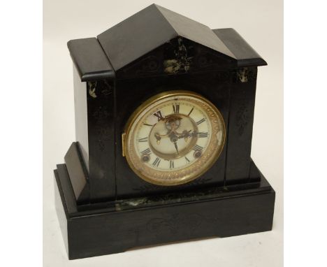 A circa 1900 black slate mantel clock having an enamelled dial with Roman numerals and eight day movement