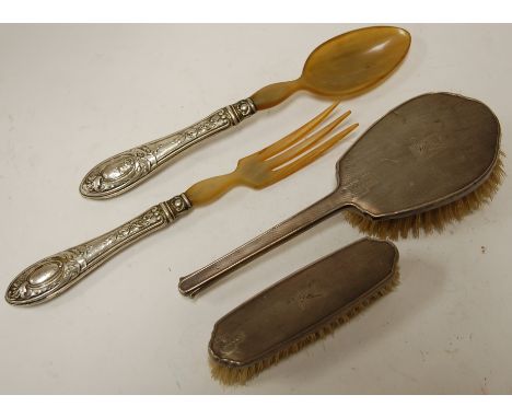 An engine turned silver backed hairbrush and clothes brush; together with 800 silver handled and horn salad servers (2)