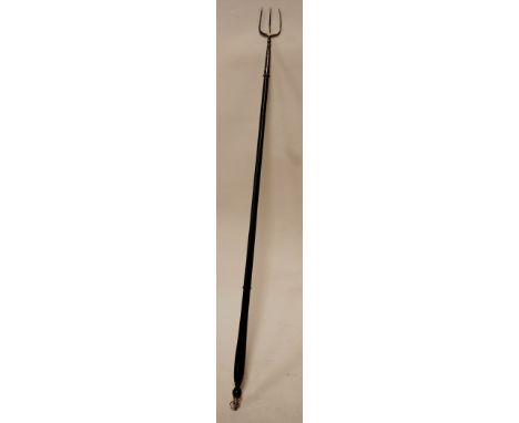 A 19th century silver toasting fork having turned ebony handle