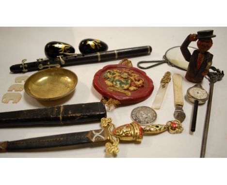 A box of miscellaneous items to include eastern souvenir dagger, cartographer's opisometer, magnifying glass etc