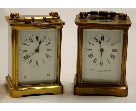 An early 20th century lacquered brass cased  carriage clock having white enamel dial with Roman numerals signed Mawson Swan &
