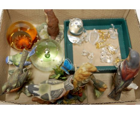 Mixed cabinet wares to include glass paperweights, Swarovski crystal animal ornaments, Goebel robin, other bisque bird orname