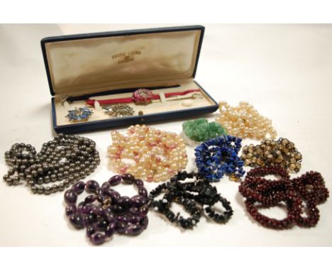 A mixed lot of costume jewellery to include lapis lazuli necklace, faux pearl necklace, polished amethyst pendant etc