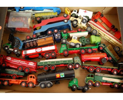 A box of loose and playworn diecast toy vehicles to include; Corgi Major Carrimore low loader, Corgi Eddie Stobart truck, Din