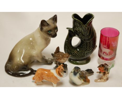 Mixed lot to include Winstanley pottery cat, Dartmouth pottery fish vase, Goebel robin, Beswick border collie, acid etched cr