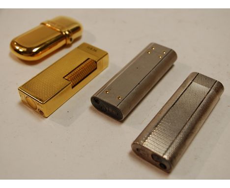 A Cartier chrome plated pocket cigarette lighter together with one other Cartier example, cased gold plated Dunhill lighter, 