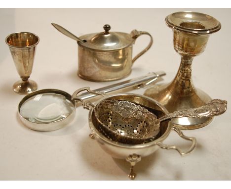 A small collection of assorted silver items to include dwarf candlestick, silver mustard of plain oval form with blue glass l