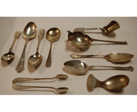 A collection of George III and later silver flatwares to include tea spoons, caddy spoon, sifting spoon etc, various dates an