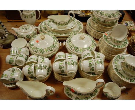 An extensive Wedgwood tea and dinner service in the Santa Clara pattern W4114, to include graduated meat plates, tureens and 