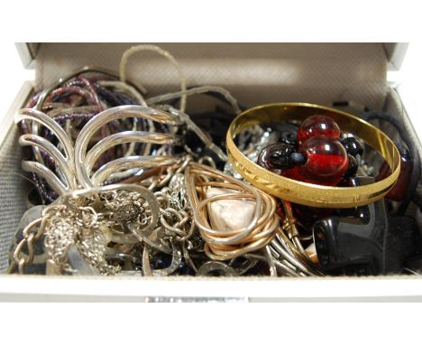 Two boxes of miscellaneous costume jewellery to include gold plated bangle, heart shaped pendant, white metal bangle etc