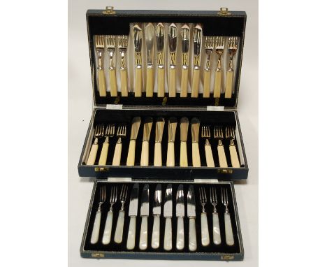 A cased set of six mother of pearl handled fruit knives and forks together with various other cased flatwares 