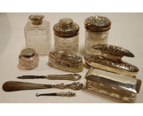 A collection of silver mounted dressing table items to include late Victorian silver nail buffer by William Comyns, Birmingha