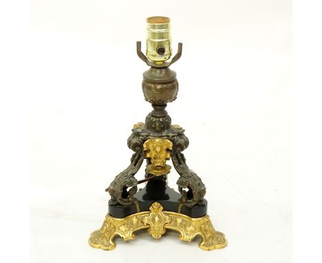 20th Century French Empire Style Gilt and Patinated Bronze Lamp with Marble Insert. Rubbing to bronze, restorations to marble