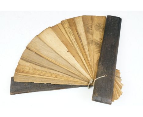 An antique Sri Lanka palm leaf manuscript comprising Buddhist mantras. 