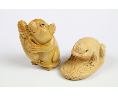 Two carved oriental Netsuke in the form of a Frog and a Mouse. 