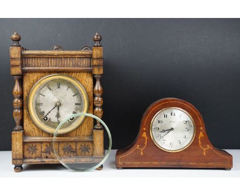 Late 19th / early 20th century carved oak mantel clock with silvered dial, together with an early 20th century 8 day movement