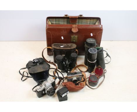 Collection of cameras, lenses &amp; binoculars within a leather case, the lot featuring Olympus FTL (with Olympus 50mm f/1.8 