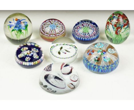 Collection of eight paperweights, including: three Perthshire Paperweights, Crieff, Scotland, each with label to underside, V