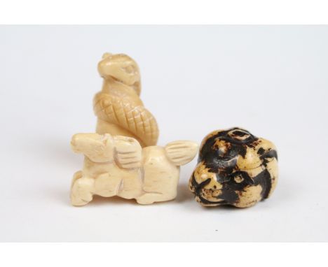 A collection of three oriental Netsuke in the form of animals 