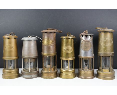 Group of six miners lamps to include E. Thomas &amp; Williams Ltd, Ferndale Coal &amp; Mining Co., The Protector Lamp &amp; L
