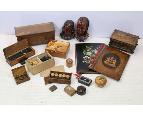 Two Achatit face wall masks, Staunton set of boxwood chessmen, a set of backgammon pieces, a set of dominoes, a treen lidded 