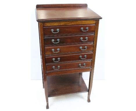 Early 20th century mahogany sheet music cabinet, with an arrangement of five drop front drawers above a shelf, 95cm high x 52