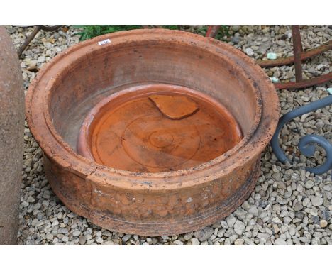 Terracotta circular garden planter with grapevine decoration (approx 66cm diameter, a/f), together with a circular terracotta