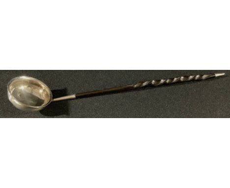 A George III silver toddy ladle, twisted whalebone handle, 34cm long, apparently unmarked, c.1780