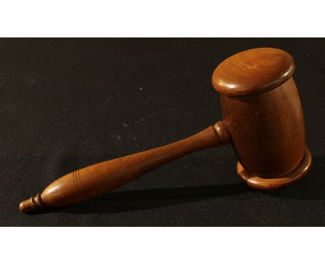 Treen - a mahogany novelty money box, as an oversized auctioneers gavel, 28cm long 